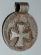 Pendant round - with a small cross in the middle - Ethiopia