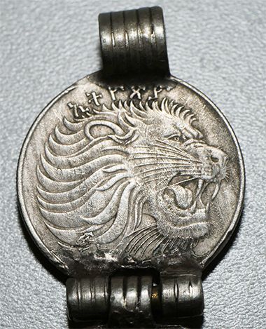 Maria Theresa Thaler attached to a 50 Birr coin - Ethiopia