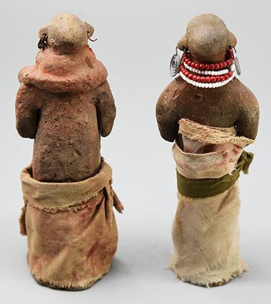 Two female clay dolls 